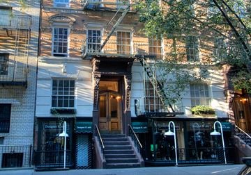 New York apartment for rent - the exterior of a building on a city street