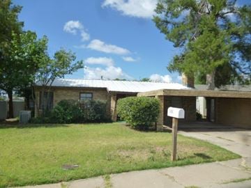 Snyder house for rent - a small brick house with a mailbox in front of it
