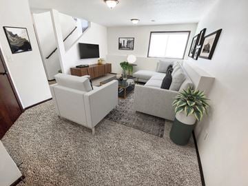 West Fargo triplex for rent - a living room with two couches and a tv