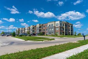 Iowa City apartment for rent - a large apartment building on the corner of a street