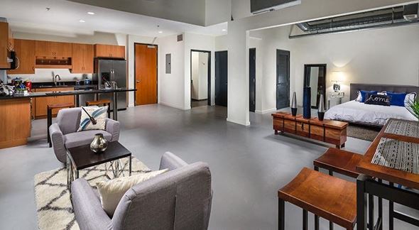 Los Angeles apartment for rent - A modern living room with a grey sofa and a coffee table.