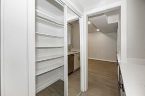 San Francisco apartment for rent - A white interior with a kitchen and a hallway.