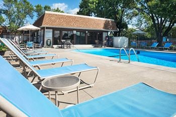 Outdoor heated swimming pool with sundeck