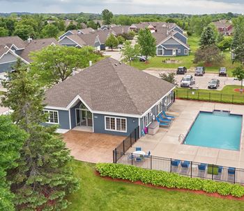 Outdoor heated swimming pool with sundeck