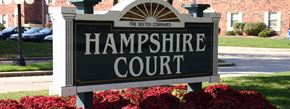 Indianapolis apartment for rent - a sign for the hampshire court in front of a building