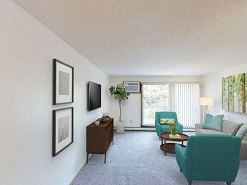 Rapid City apartment for rent - the living room of a hotel room with a couch and chairs