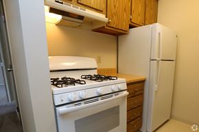 Eastlake apartment for rent - Efficient Appliances In Kitchen at Willowood Apartments, Ohio