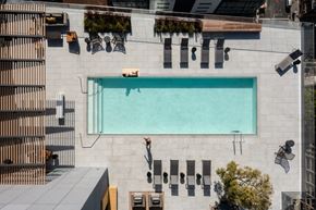 Oakland apartment for rent - an aerial view of a pool on the side of a building
