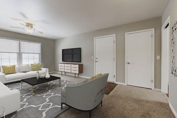 Omaha apartment for rent - a living room with a couch and a coffee table