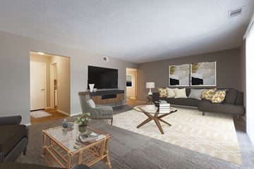 Omaha apartment for rent - a living room with a couch and a television