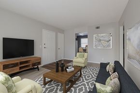 Omaha apartment for rent - a living room with a couch and a tv