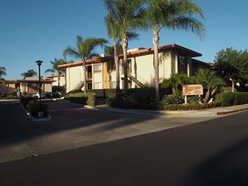 San Diego apartment for rent - A building with a brown sign in front of it.