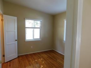 La Mesa apartment for rent - a empty room with a window and wooden floors