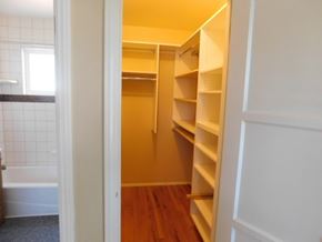 La Mesa apartment for rent - a walk in closet with shelves and a door