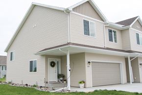West Fargo townhouse for rent - the front of a house with a garage door