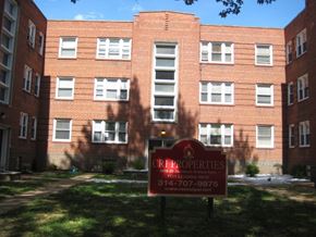 St. Louis apartment for rent - a brick building with a sign in front of it