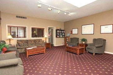 Warwick apartment for rent - a living room with couches chairs and a table