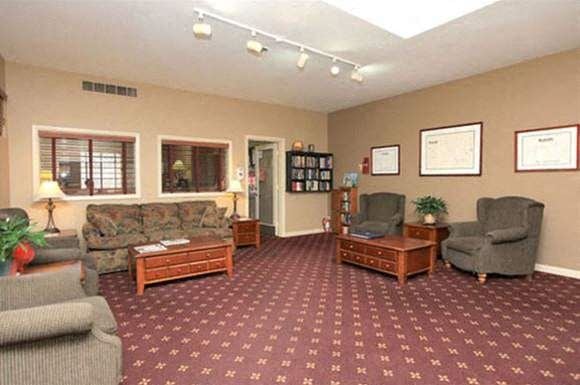 Warwick apartment for rent - a living room with couches chairs and a table
