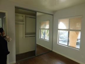 San Diego apartment for rent - an empty room with a window and a mirror