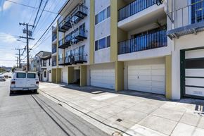 San Francisco apartment for rent - a van parked on a street in front of an apartment building