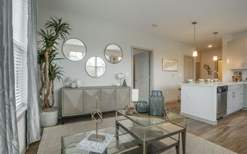 East Walpole apartment for rent - a living room with a glass table and a kitchen