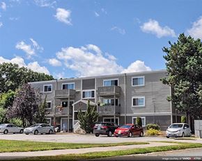 Warwick apartment for rent - an apartment building with cars parked in front of it