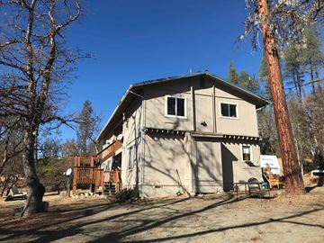 Hayfork apartment for rent - the back of the house with the deck and trees