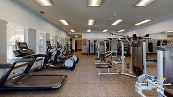 Fitness center with cardio and strength training equipment