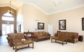 Burton apartment for rent - a living room with couches and a table