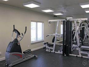 Burton apartment for rent - a gym with weights and other exercise equipment