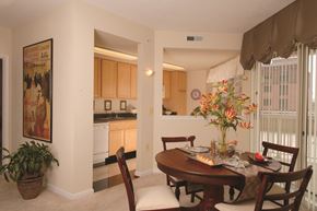 Baltimore apartment for rent - a dining room and kitchen with a table and chairs