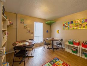 Houston apartment for rent - a dining room with a table and chairs
