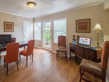 Austin apartment for rent - a living room and dining room with a table and chairs