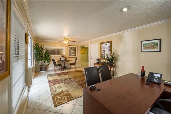 Houston apartment for rent - a living room with a wooden table and chairs