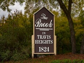 Austin apartment for rent - a sign that reads the brook