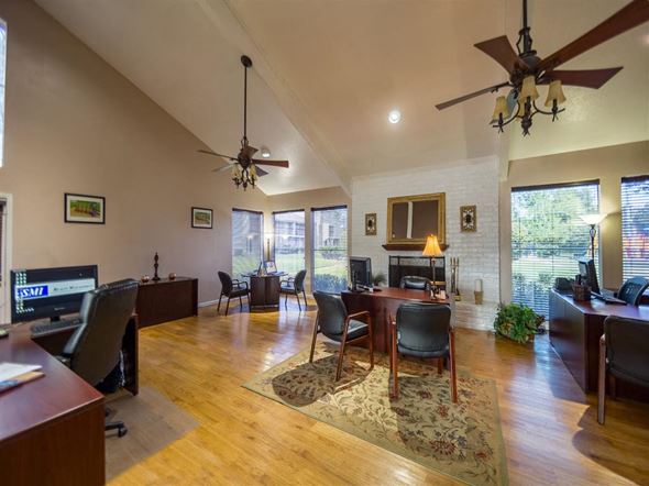 Houston apartment for rent - a living room and dining room with a table and chairs