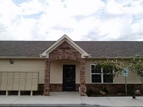 North Little Rock apartment for rent - the front of a brick building with a black door