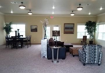 North Little Rock apartment for rent - a living room with furniture and a dining room table