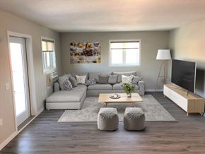 Portage La Prairie apartment for rent - a living room with a couch and a coffee table