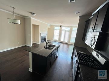 Atlanta house for rent - a view of a kitchen with a stove and a sink