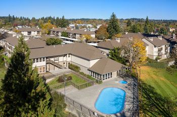 Seasonal swimming pool with sundeck