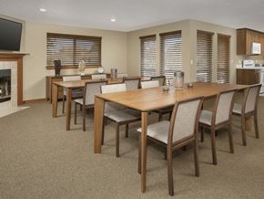 Gladstone apartment for rent - A dining room with a long table and chairs.