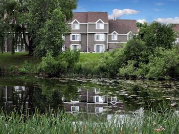 Pond or wooded views