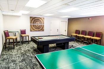 Billiards room with table tennis