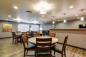 Fargo apartment for rent - a dining room with a round table and chairs