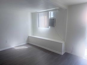 Los Angeles apartment for rent - A room with a window and air conditioner.