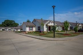 Van Buren triplex for rent - a row of houses on a street in a suburban neighborhood