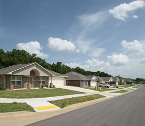 Van Buren triplex for rent - a neighborhood of manufactured homes on a street