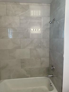 Glendale apartment for rent - a bathroom with a shower and a bath tub