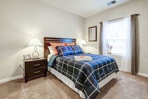 Murrysville apartment for rent - a bedroom with a bed and a window